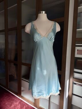 Victoria's Secret • baby blue satin slip dress with lace trim.